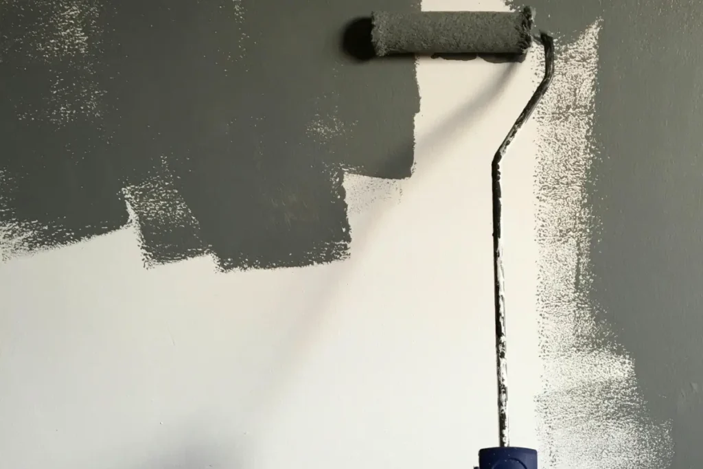 first coat appllying on wall interior painting